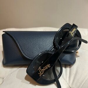 Loewe Black Round Frame Sunglasses with Gold Accents